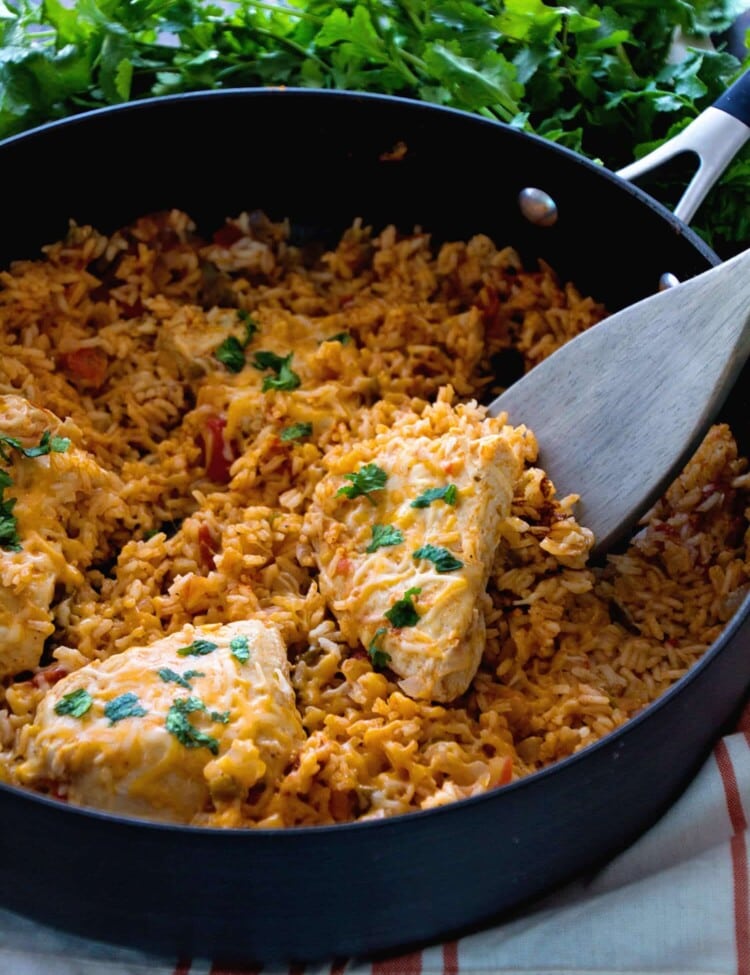 One Pot Fiesta Chicken & Rice Recipe ~ Quick, Easy One Pot Dinner with a Southwestern Flair! Cheesy Chicken In a Bed of Southwestern Rice Makes the Perfect Quick Meal!