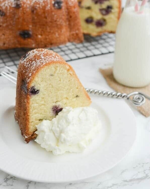 Blueberry Sour Cream Pound Cake Recipe ~ This Easy Dessert Is Perfectly Moist and Soft! Stuffed with Juicy Blueberries and Dusted with Powdered Sugar!