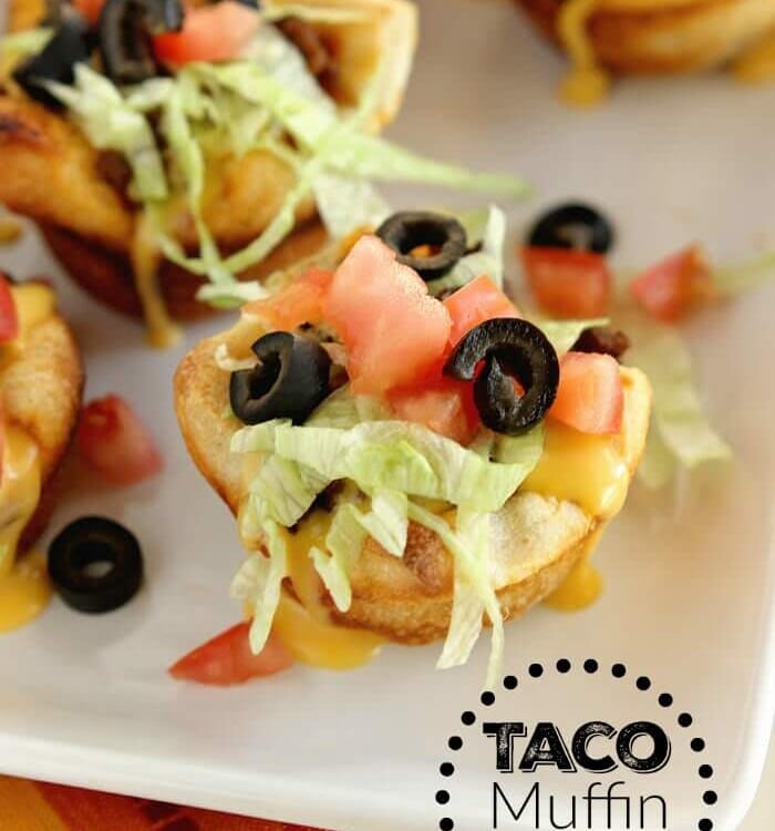 Taco Muffin Cups Recipe - These little muffins made with pizza dough and filled with ground beef and taco fixings make a perfect easy weeknight dinner idea!