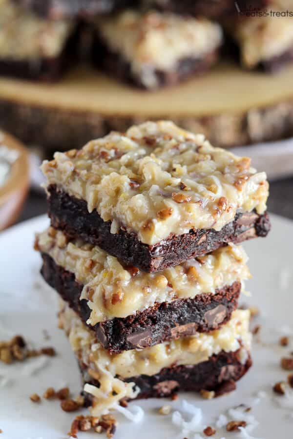 German Chocolate Brownies Recipe ~ Rich chocolaty brownies topped with a gooey homemade coconut pecan frosting. Make the brownies from scratch, or use a boxed brownie mix as the base of this recipe. You'll love this decadent dessert!