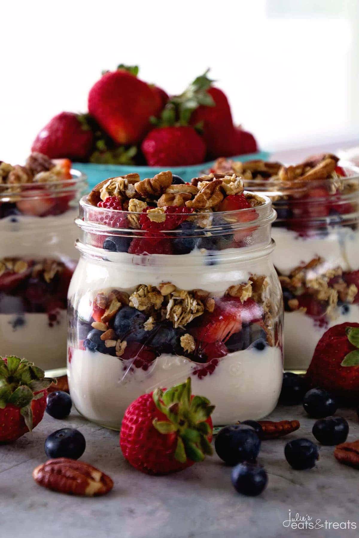 Berry Yogurt Breakfast Parfait ~ Quick, Healthy Breakfast for Mornings When You Are on the Go! Layers of Greek Yogurt, Granola, Strawberries, Blueberries, Raspberries and Pecans!