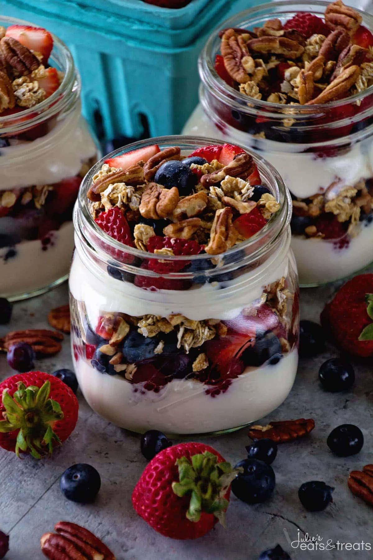 Berry Yogurt Breakfast Parfait ~ Quick, Healthy Breakfast for Mornings When You Are on the Go! Layers of Greek Yogurt, Granola, Strawberries, Blueberries, Raspberries and Pecans!