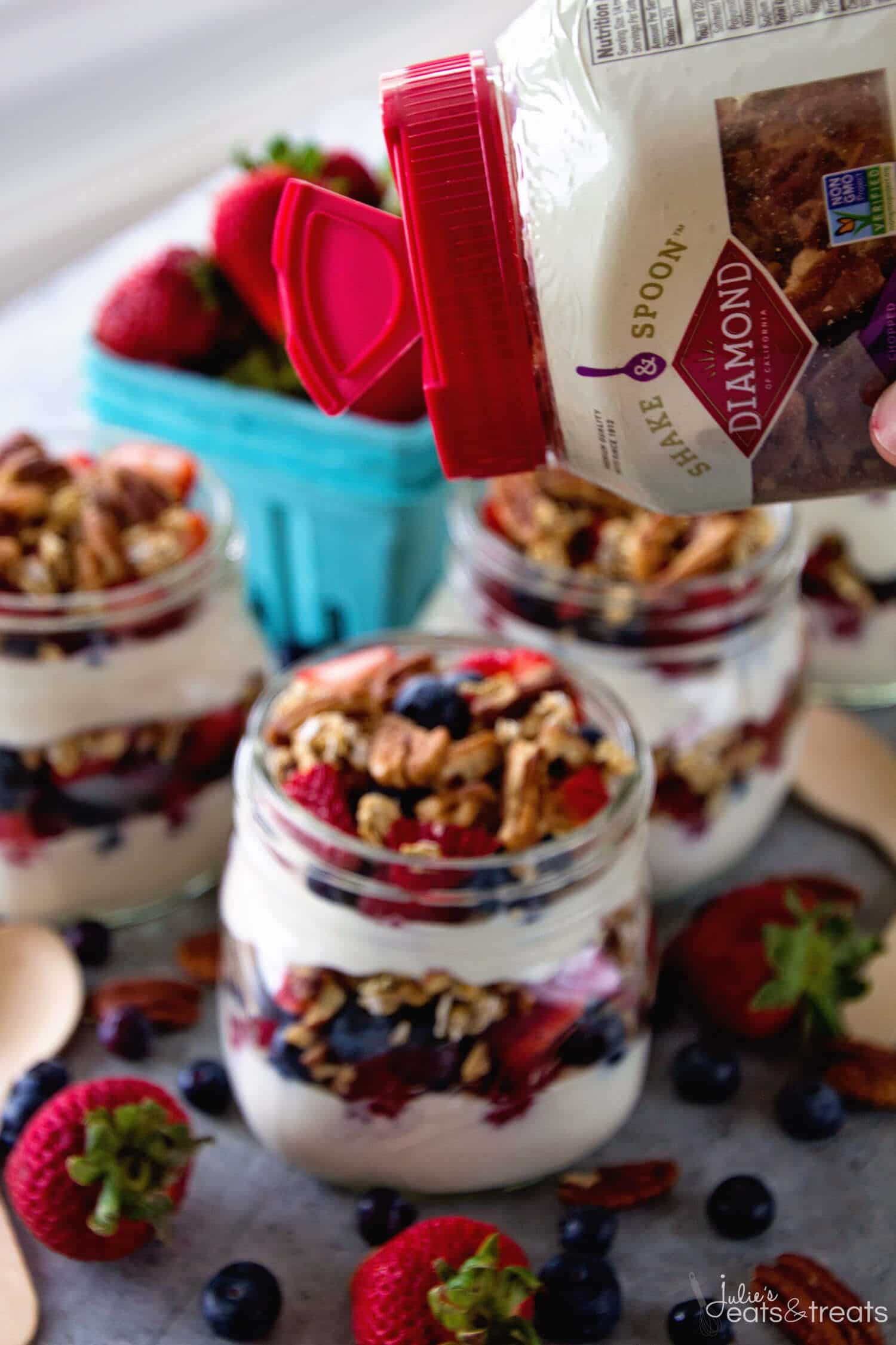 Berry Yogurt Breakfast Parfait ~ Quick, Healthy Breakfast for Mornings When You Are on the Go! Layers of Greek Yogurt, Granola, Strawberries, Blueberries, Raspberries and Pecans!