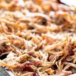 Easy pulled pork from the smoker on a baking sheet