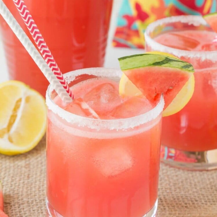 Spiked Watermelon Lemonade is a delicious blend of watermelon, frozen lemonade and vodka. This is one adult drink you won't want to pass up this summer!