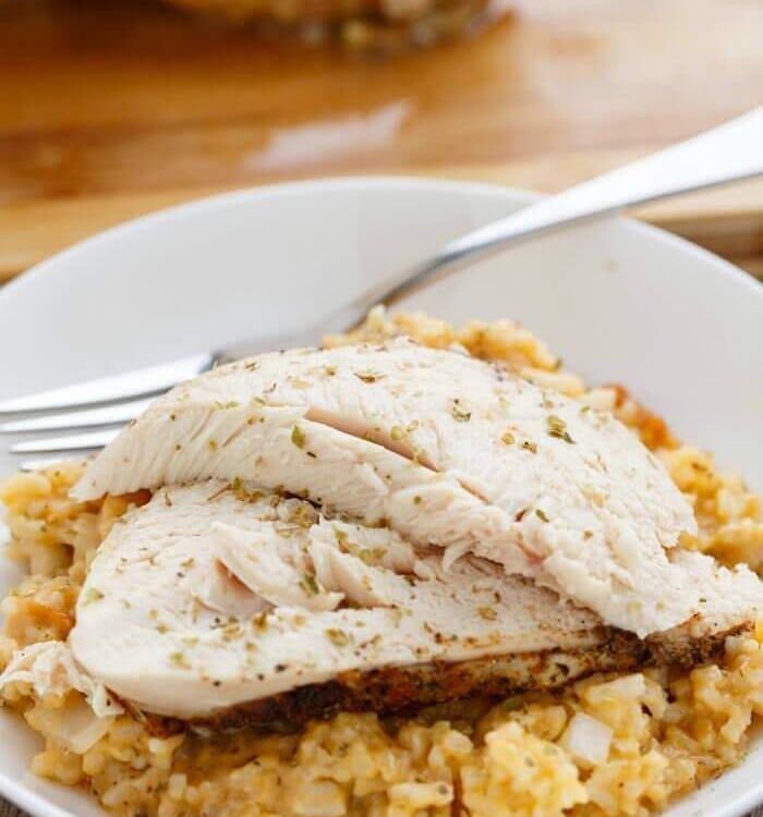 Crock Pot Chicken and Rice Dinner ~ Whole Chicken and Rice in the Slow Cooker Flavored with Onions and Spices! You can't Go Wrong with this Meal in the Crock Pot!
