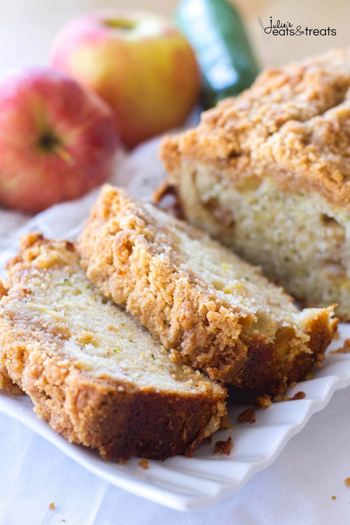 Slices of Crumb Apple Zucchini Bread ~ Easy, Quick Bread Recipe Filled with Fresh Grated Zucchini and Sweet Apples then Topped with a Delicious Cinnamon Brown Sugar Crumb Topping!