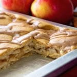 A pan of easy apple pie bars with two bars missing