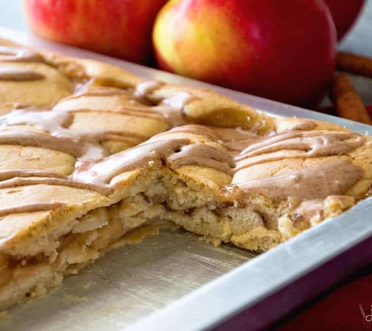 A pan of easy apple pie bars with two bars missing