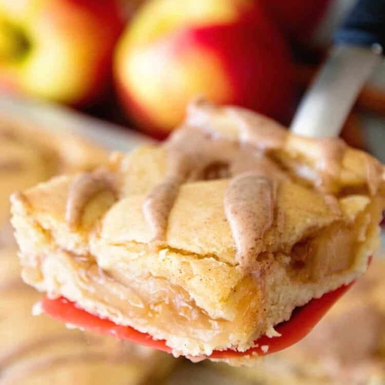 Easy Apple Pie Bars ~ Quick and Easy Bars Stuffed with Apple Pie Filling in between a Soft and Delicious Cinnamon Crust then Drizzled with Cinnamon Icing! Perfect Fall Treat!