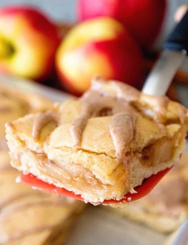 Easy Apple Pie Bars ~ Quick and Easy Bars Stuffed with Apple Pie Filling in between a Soft and Delicious Cinnamon Crust then Drizzled with Cinnamon Icing! Perfect Fall Treat!