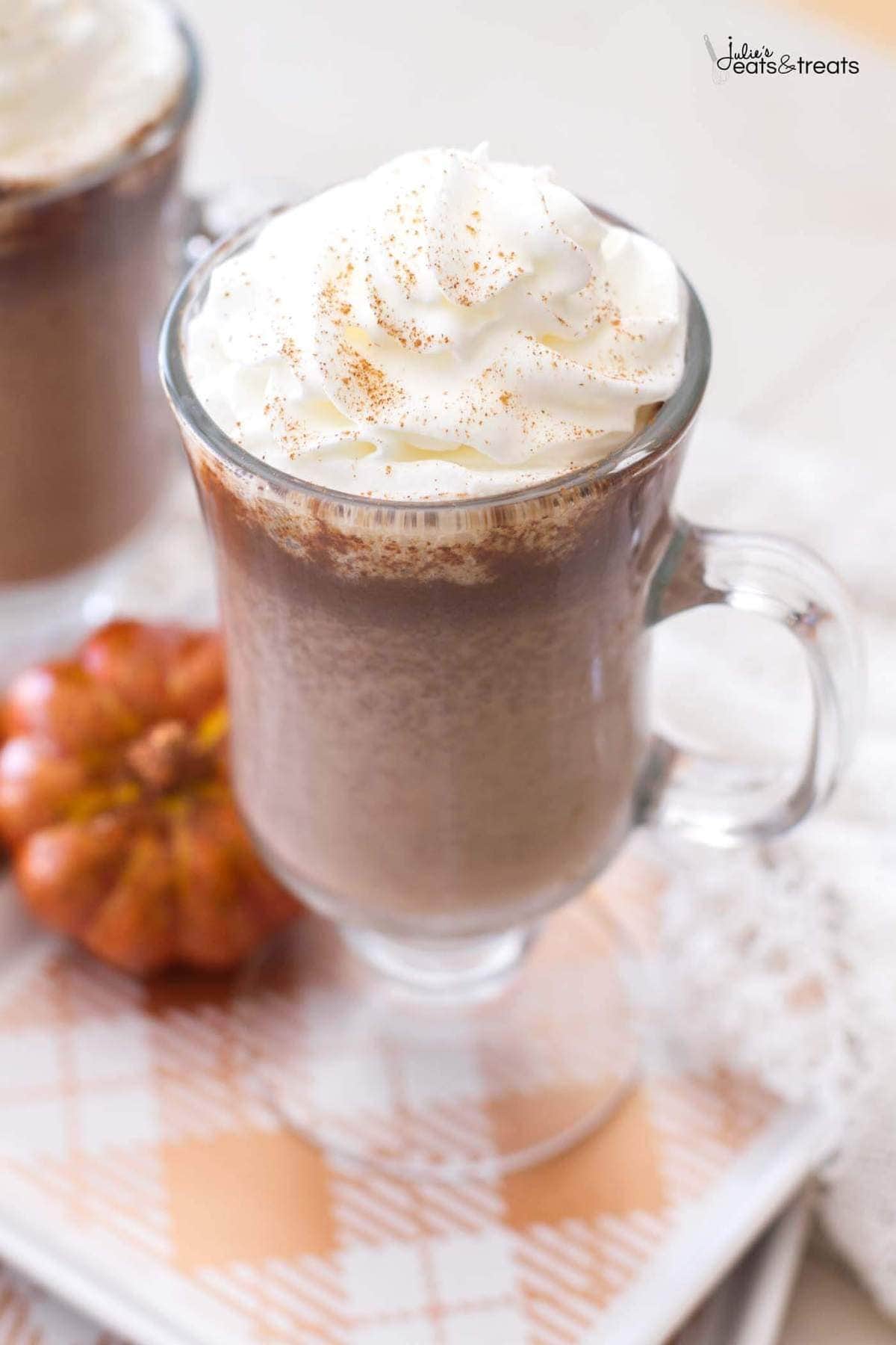 This homemade pumpkin hot chocolate recipe uses real pumpkin puree and pumpkin pie spices to add a fall spin to a classic drink!