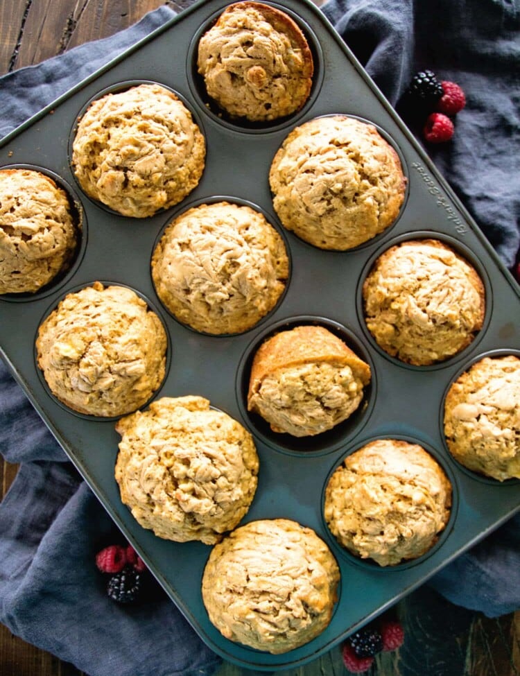 Healthier Peanut Butter Banana Muffins ~ This Peanut Butter and Banana Combo Muffin is so Delicious! They are made with Whole Wheat Flour and Oats to Fill You Up at Breakfast!