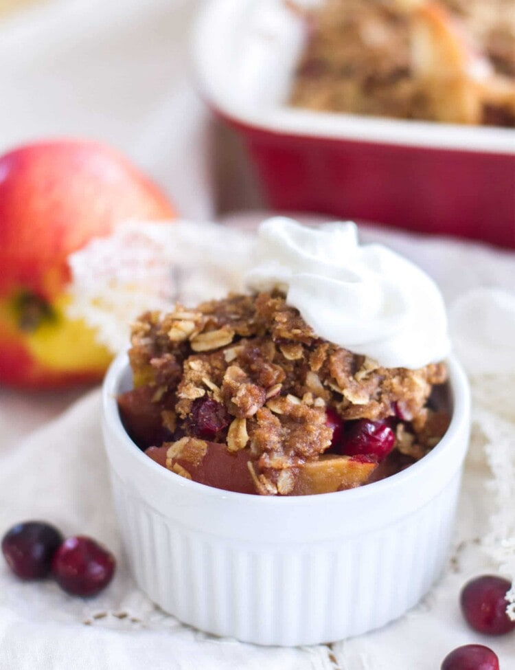This easy fruit crisp recipe is filled with sweet apples and fresh cranberries, and is topped with the best brown sugar cinnamon crumble! A simple dessert perfect for the holiday season!