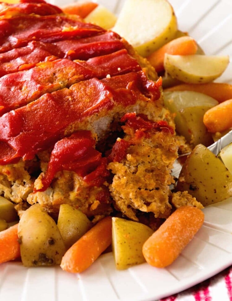 Crock Pot Meatloaf & Veggies ~ Comforting, Meatloaf Topped with Ketchup and Made in the Slow Cooker with Potatoes and Carrots! Make Your Entire Meal in the Crock Pot Tonight!