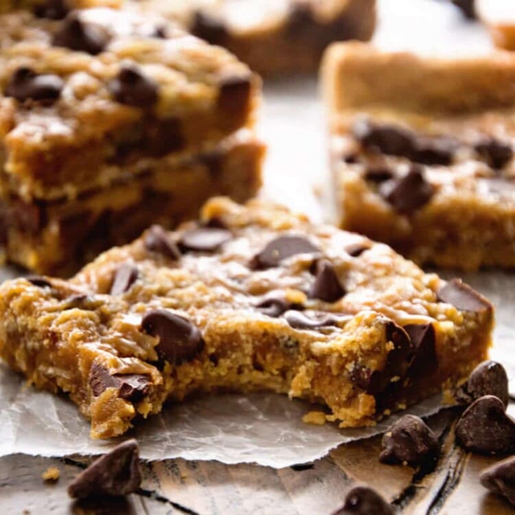 Oatmeal chocolate chip bars on a piece of wax paper