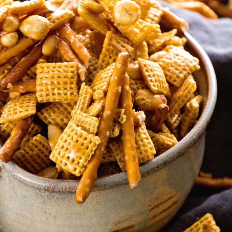 Caramel Chex Mix ~ The Perfect Blend of Sweet & Salty in this Snack Mix! Plus it's Perfect for Parties! Loaded with Chex, Peanuts, Pretzels and Coated in a Caramel!