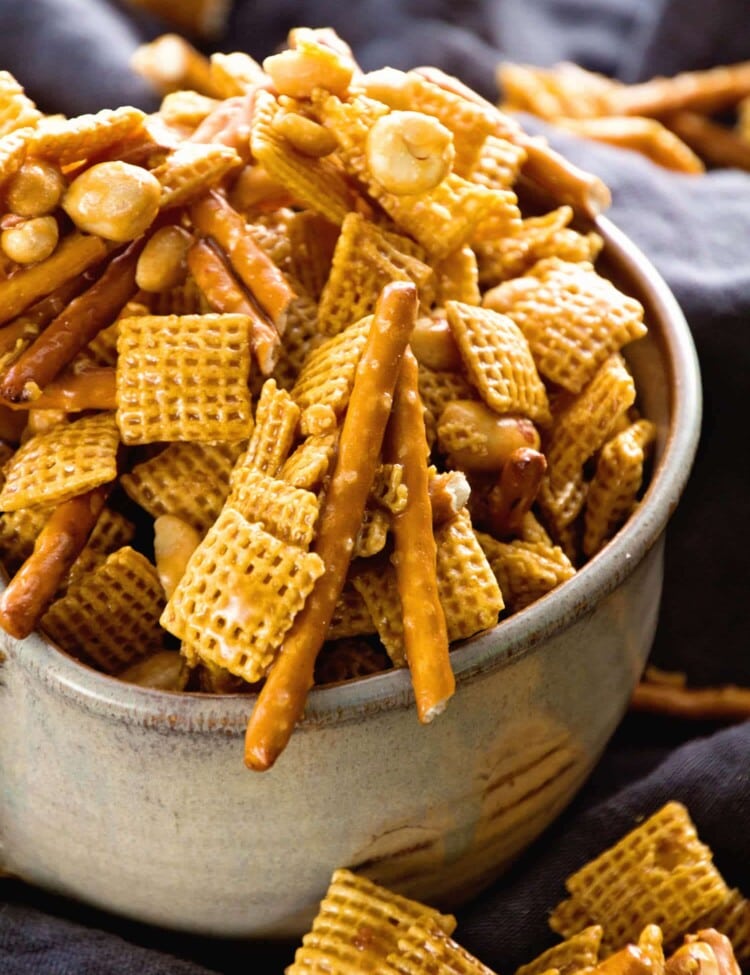 Caramel Chex Mix ~ The Perfect Blend of Sweet & Salty in this Snack Mix! Plus it's Perfect for Parties! Loaded with Chex, Peanuts, Pretzels and Coated in a Caramel!