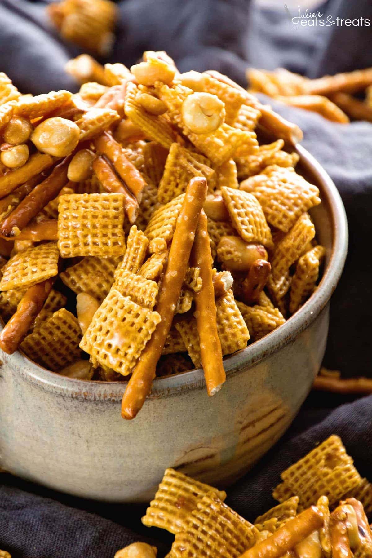 Caramel Chex Mix ~ The Perfect Blend of Sweet & Salty in this Snack Mix! Plus it's Perfect for Parties! Loaded with Chex, Peanuts, Pretzels and Coated in a Caramel!