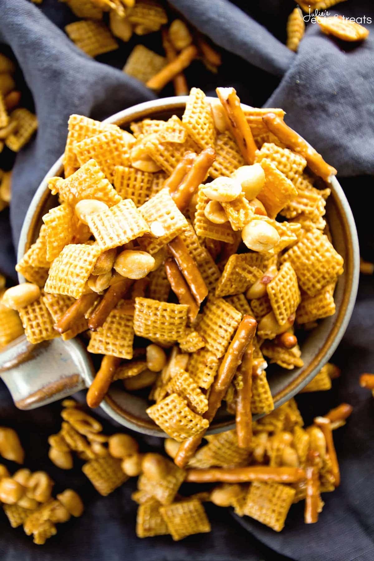 Caramel Chex Mix ~ The Perfect Blend of Sweet & Salty in this Snack Mix! Plus it's Perfect for Parties! Loaded with Chex, Peanuts, Pretzels and Coated in a Caramel!