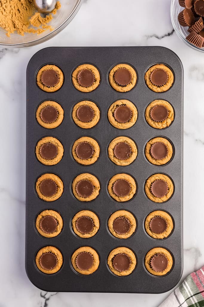 Overhead image of peanut butter cup cookies in mini muffin tin