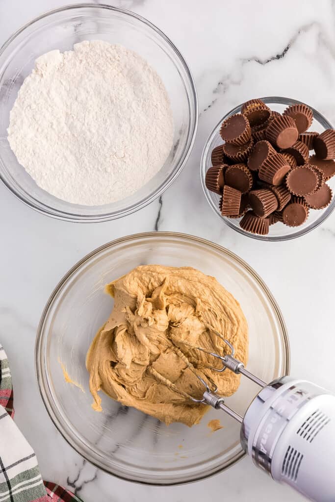 Peanut Butter cookie dough mixed in glass bowl