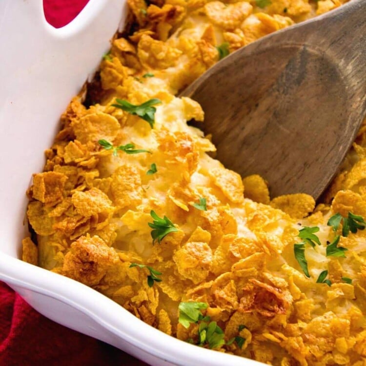 Cheesy Hash Brown Chicken Casserole ~ Your Favorite Cheesy Hash Brown Casserole In a Main Dish! Comforting Casserole Loaded with Hash Browns, Cheese, and Chicken Perfect for Dinner!