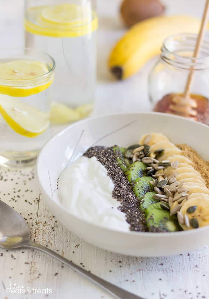 Smoothie Bowl ~ Start off your day with this nutritious meal ready in less than 5 minutes. An easy breakfast with yogurt, fruits and seeds. ~ https://www.julieseatsandtreats.com