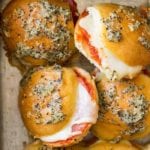 A cake pan full of pizza slider sandwiches