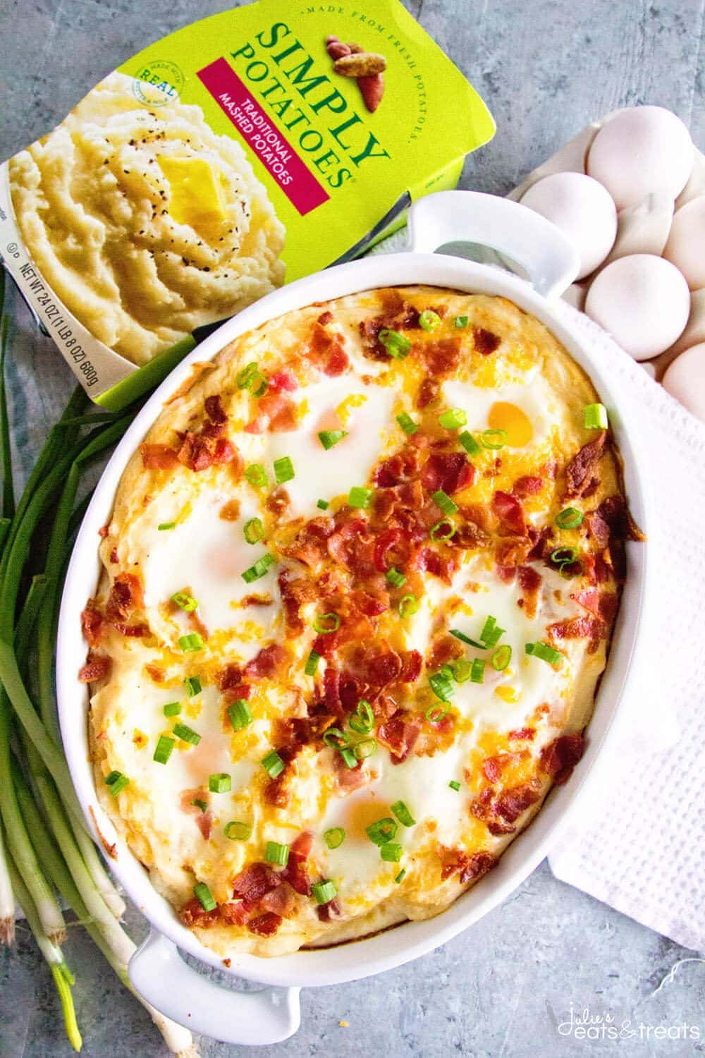 Cheesy Mashed Potato Egg Casserole ~ Perfect Breakfast or Brunch Casserole Loaded with Mashed Potatoes, Eggs, Cheese and Bacon! This Hearty Breakfast Recipe is Perfect for Entertaining!