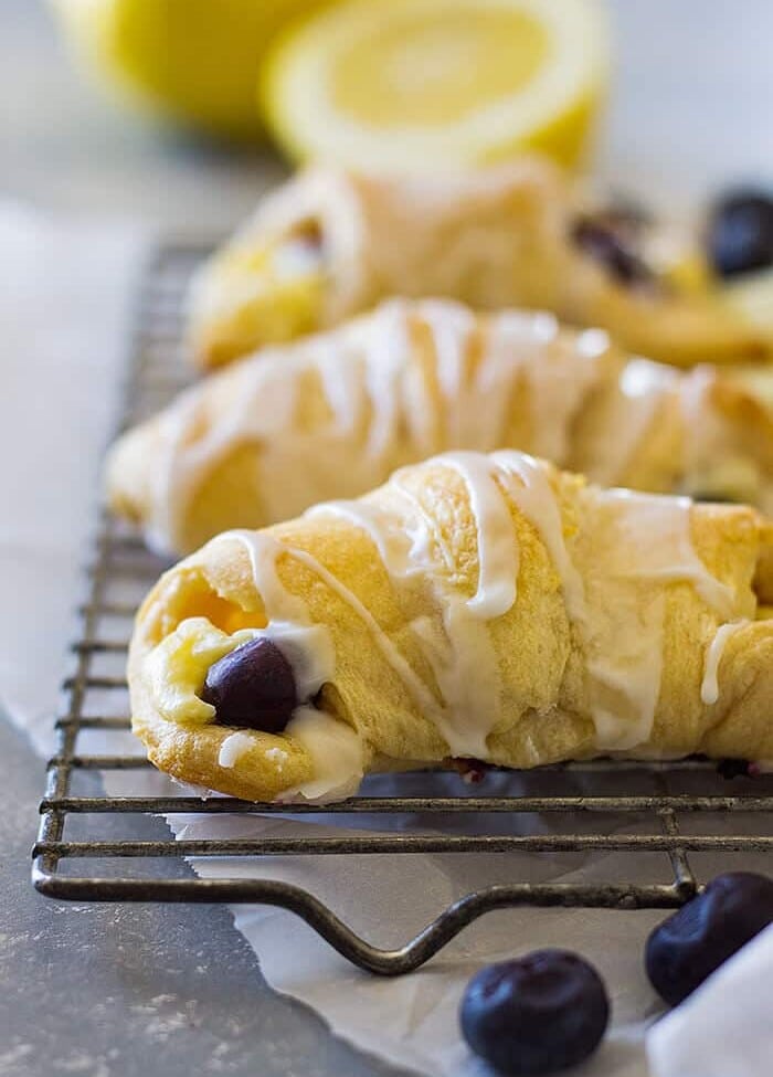 These Lemon Blueberry Cheesecake Crescent Rolls are filled with creamy, sweet and tangy lemon filling and bursting with fresh blueberries!