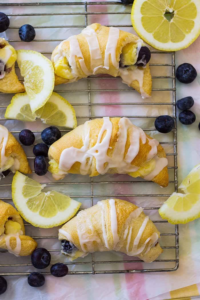 These Lemon Blueberry Cheesecake Crescent Rolls are filled with creamy, sweet and tangy lemon filling and bursting with fresh blueberries! 