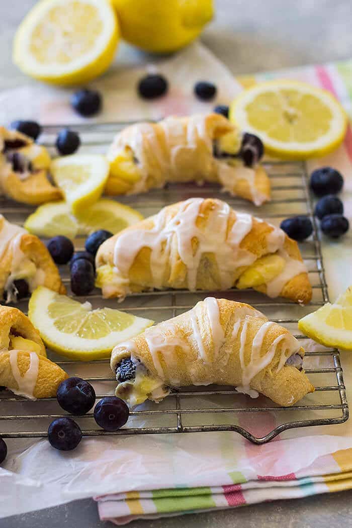 These Lemon Blueberry Cheesecake Crescent Rolls are filled with creamy, sweet and tangy lemon filling and bursting with fresh blueberries! 