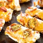 Pepperoni french bread pizza slices on a baking sheet
