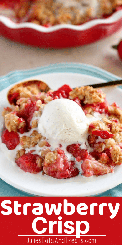 Strawberry crisp topped with a scoop of vanilla ice cream on a white plate