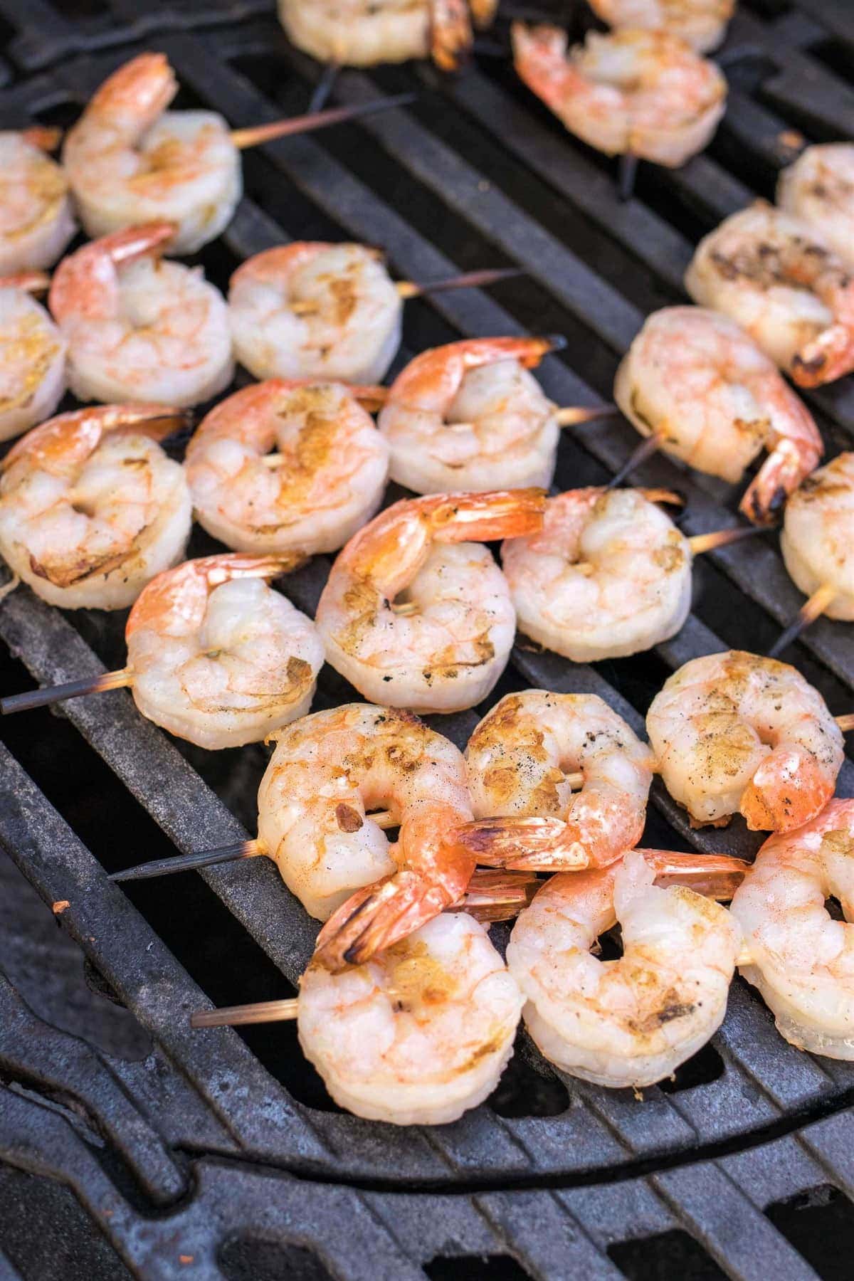 Grilled Bang Bang Shrimp Skewers - Grilled shrimp skewers covered in a spicy, creamy, sweet chili sauce. Perfect for the summer barbecues!