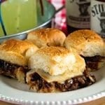 For instant pot brisket sliders with caramelized onion on a white plate
