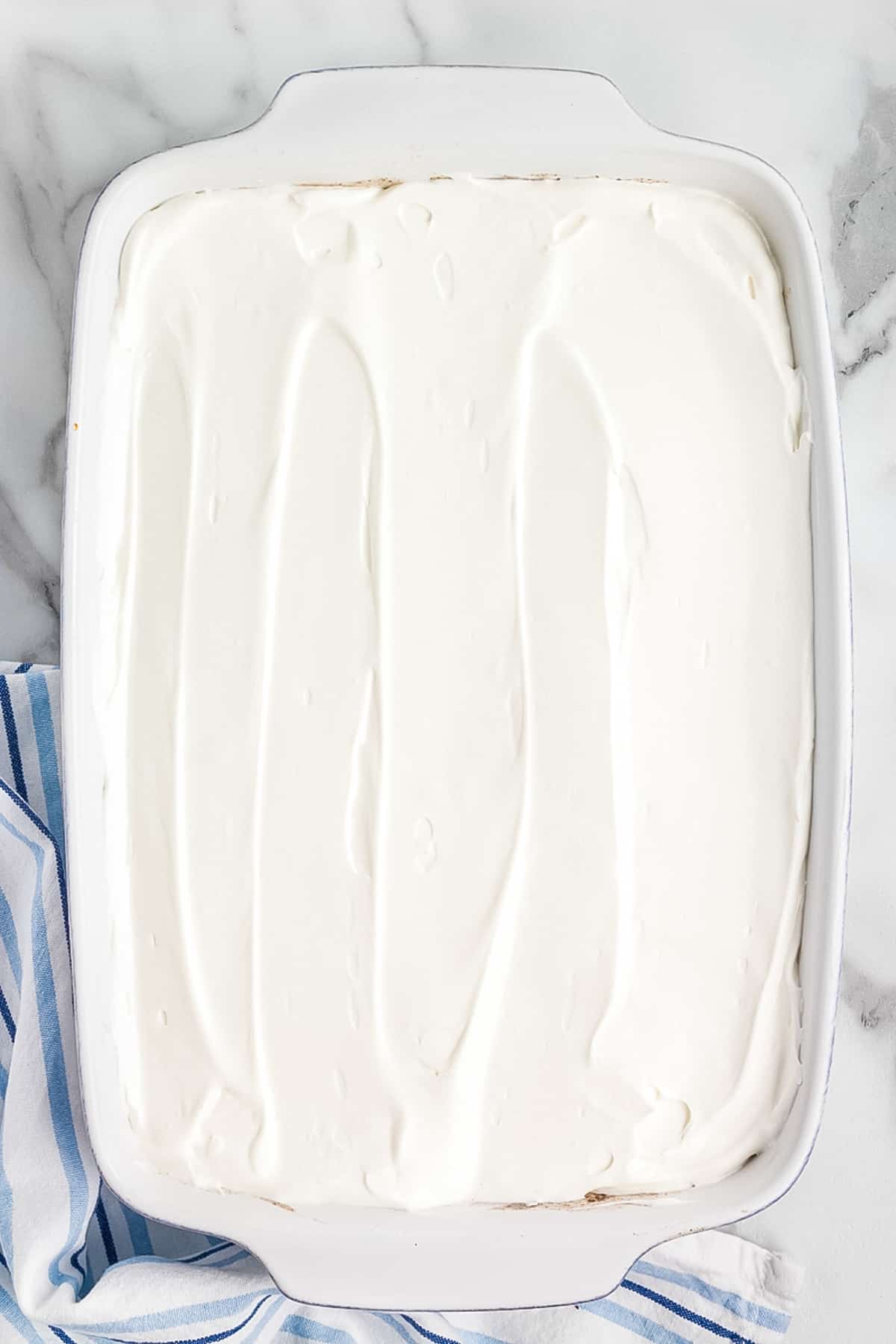 Cake topped with Cool Whip