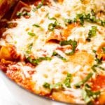Summer vegetable one pot lasagna in a white skillet pan