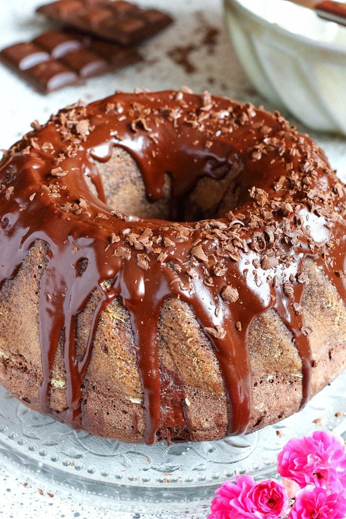 Chocolate Bundt Cake. Wow your guests with this pretty and easy dessert! It’s covered with chocolate glaze, chocolate shavings and has chocolate pieces inside! 