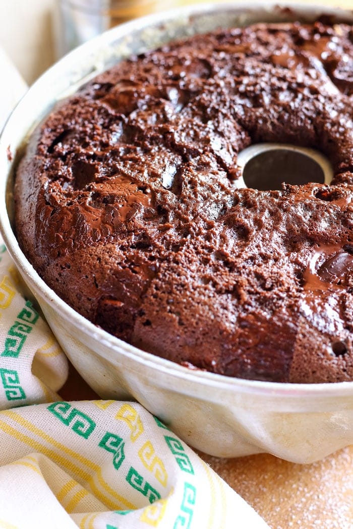 Chocolate Bundt Cake. Wow your guests with this pretty and easy dessert! It’s covered with chocolate glaze, chocolate shavings and has chocolate pieces inside!