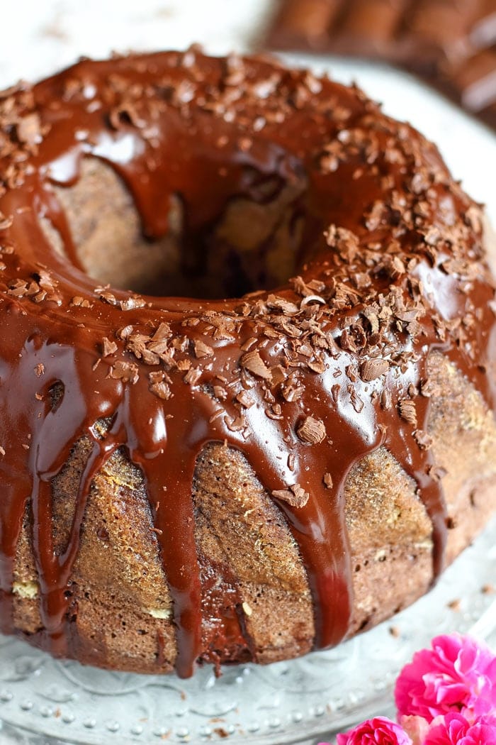 Chocolate Bundt Cake. Wow your guests with this pretty and easy dessert! It’s covered with chocolate glaze, chocolate shavings and has chocolate pieces inside!