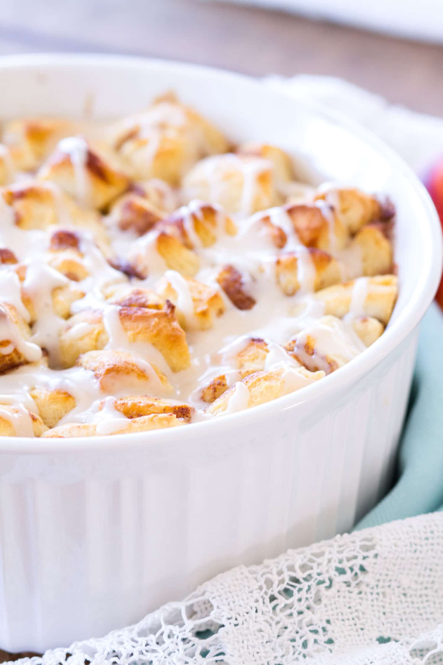 This Easy Cinnamon Roll Peach Cobbler is made with fresh peaches, sweet spices, and pre-made cinnamon roll dough. The final component of this cinnamon roll peach cobbler recipe is a sweet vanilla glaze, making this a quick and easy summer dessert! 