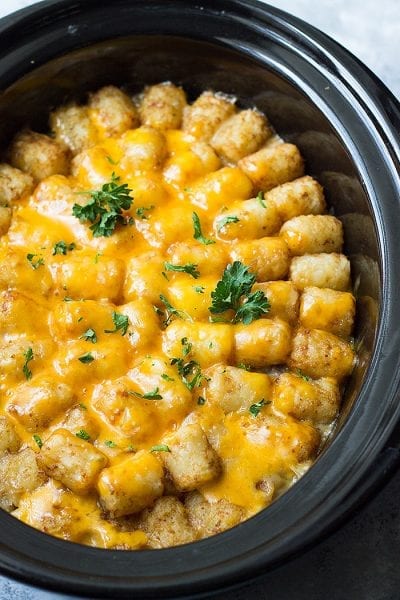 This Slow Cooker Bacon Cheeseburger Tater Tot Casserole is a fun twist on a classic. It's made completely from scratch with no canned soup.
