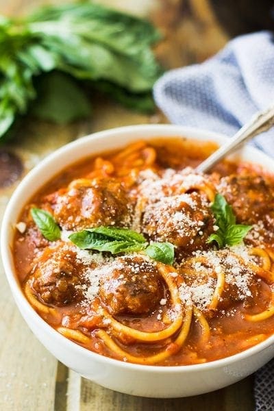 THIS SLOW COOKER SPAGHETTI MEATBALL SOUP IS PURE COMFORT FOOD! A WONDERFUL TOMATO SOUP FILLED WITH FLAVORFUL MEATBALLS AND TENDER SPAGHETTI!
