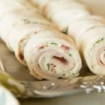 Cheesy turkey bacon ranch pinwheels on a sliver tray