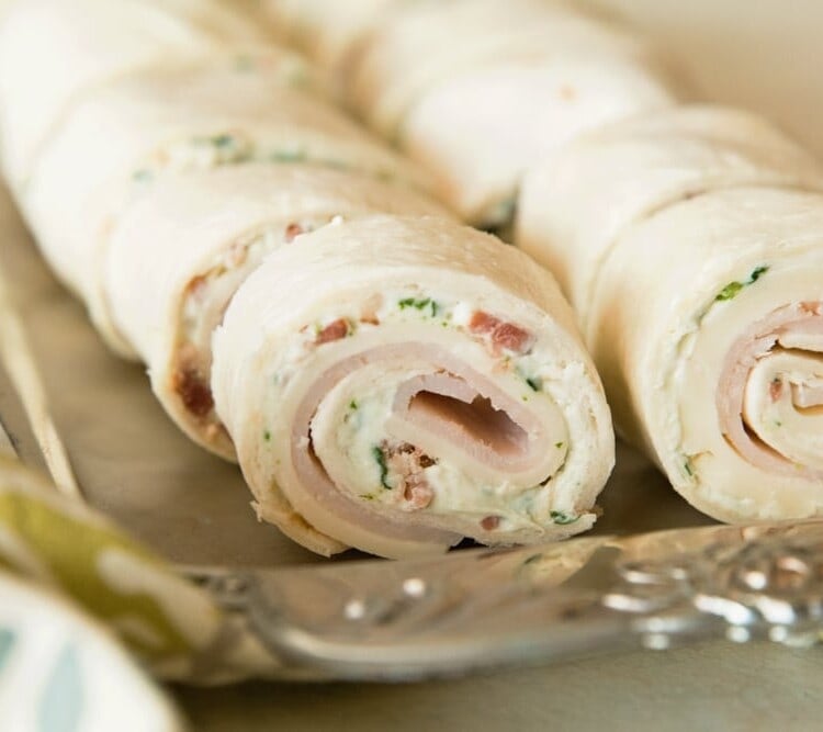 Cheesy turkey bacon ranch pinwheels on a sliver tray