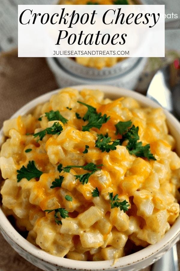 Crockpot cheesy potatoes in a white bowl