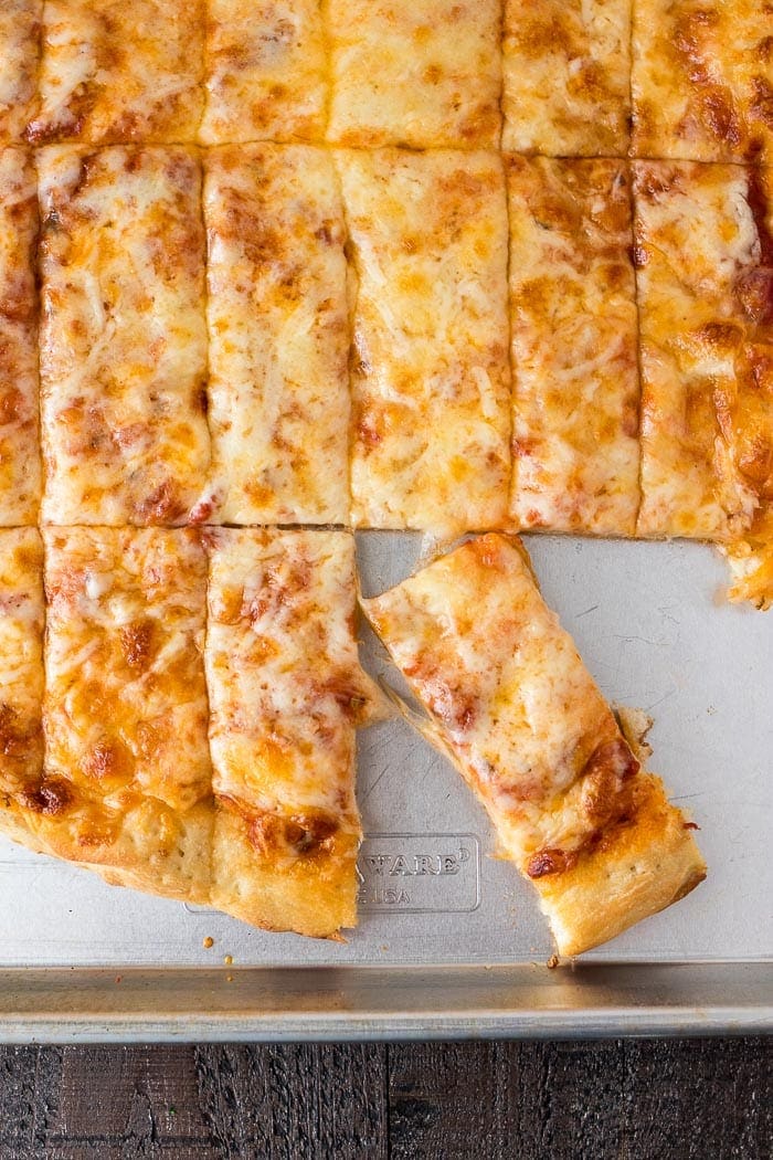 Four Cheese Pizza Dunkers ~ Homemade Pizza Layered with Mozzarella, Asiago, Provolone and Parmesan Cheese! Cut into Rectangles and Perfect for Dipping in Your Favorite Sauces!