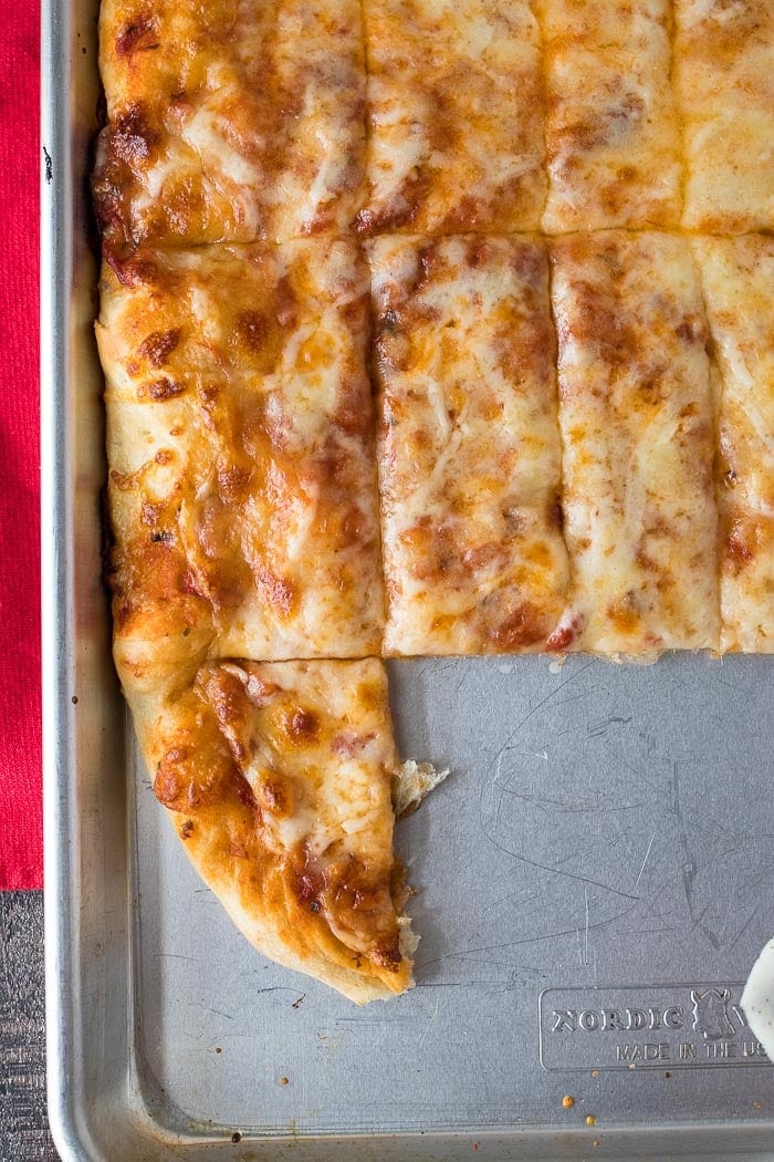 Four Cheese Pizza Dunkers ~ Homemade Pizza Layered with Mozzarella, Asiago, Provolone and Parmesan Cheese! Cut into Rectangles and Perfect for Dipping in Your Favorite Sauces!